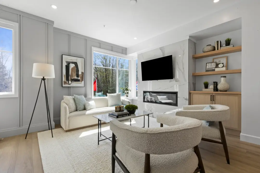 Crofton living room with recessed lighting, linear fireplace, and wall-mounted TV