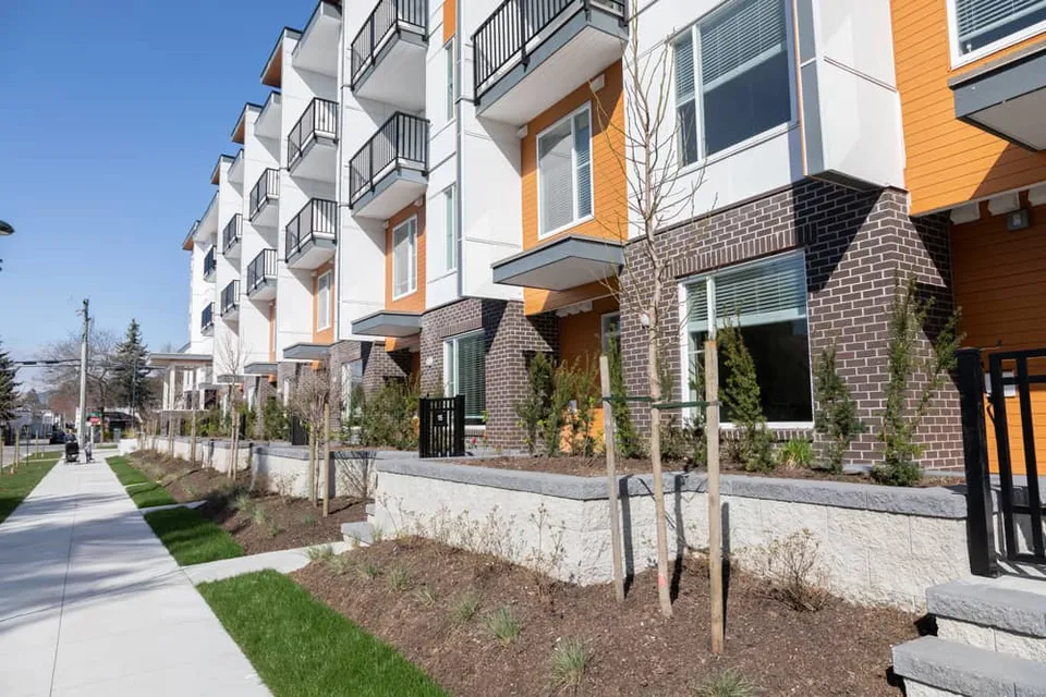 Phoenix Citylife side of the building in Surrey, with ground-floor unit entries
