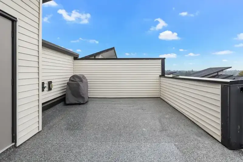 Summit rooftop with weatherproof outlet and covered BBQ