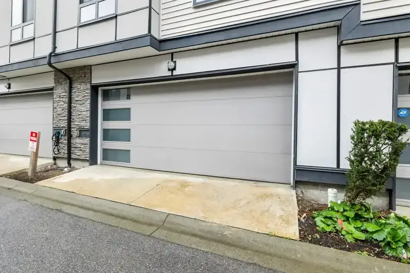Summit unit 21 garage close-up with exterior light and outlet