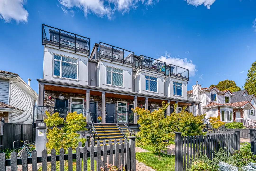 Alternate street elevation of Earles townhome row showing porch and glass rooftop rails