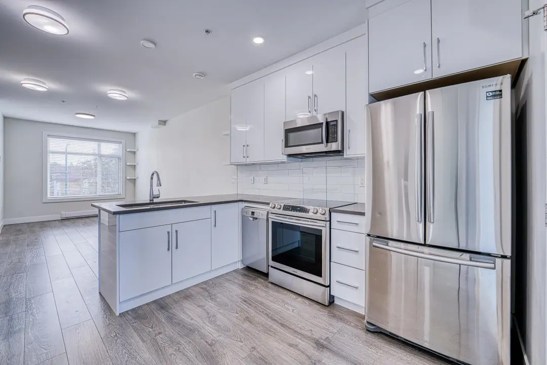 Earles kitchen worktop with under-cabinet LED lighting and stainless appliances